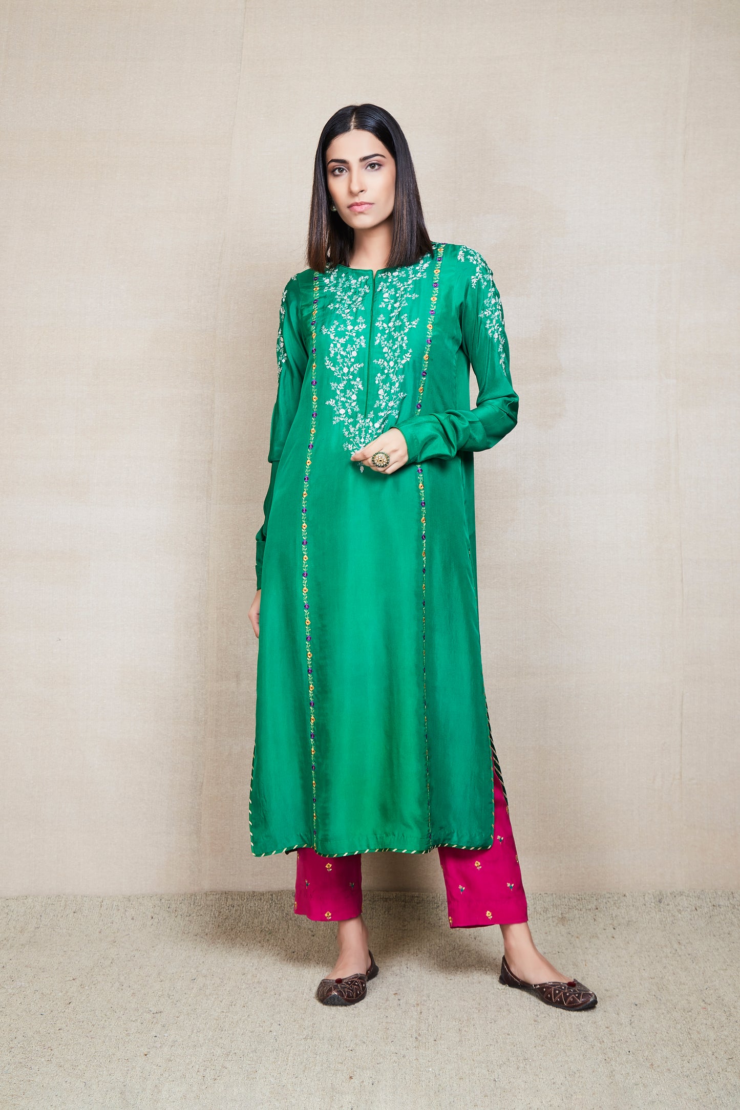 maushmi dark green kurta set