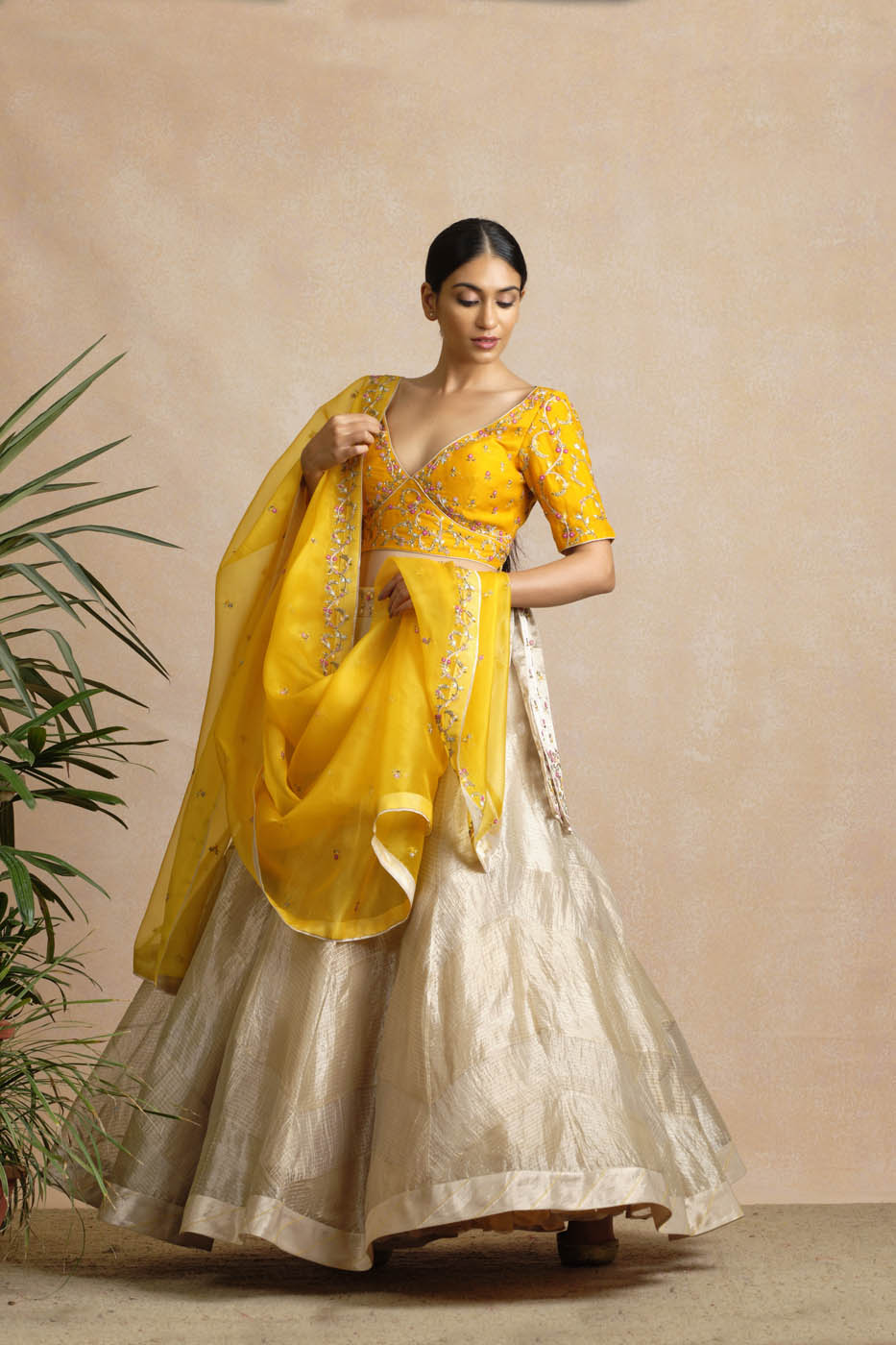 Actress Mrunal Thakur Wear Dusty Yellow Embroidery Work Lehenga Choli